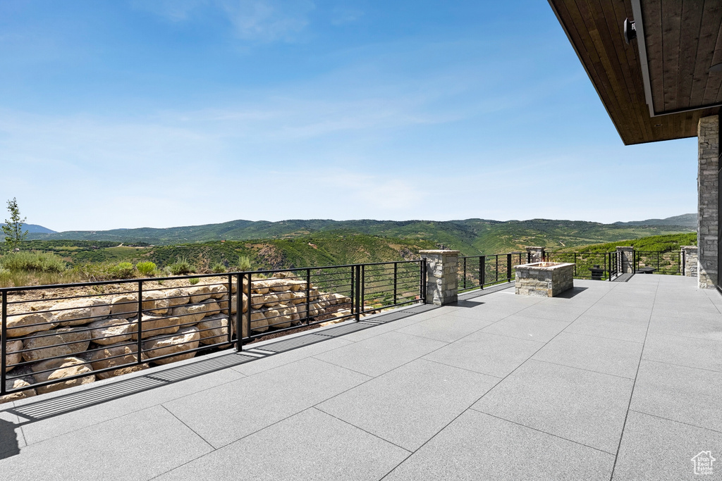 View of patio with a mountain view