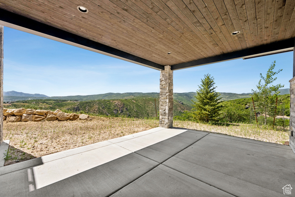 View of patio with a mountain view