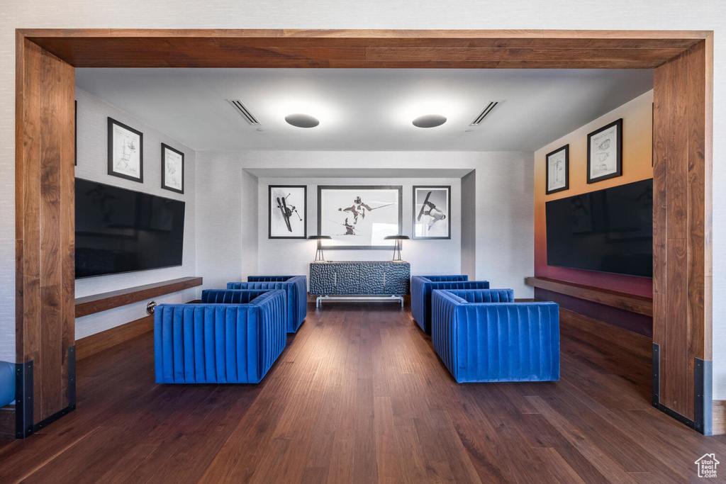 Living room featuring dark hardwood / wood-style flooring