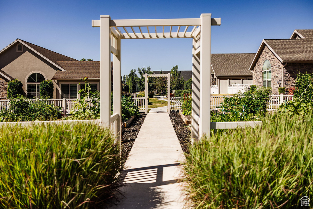 View of property's community with a pergola