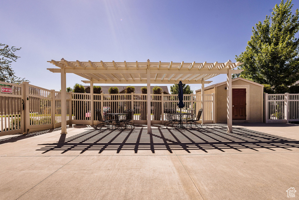 View of patio with a pergola