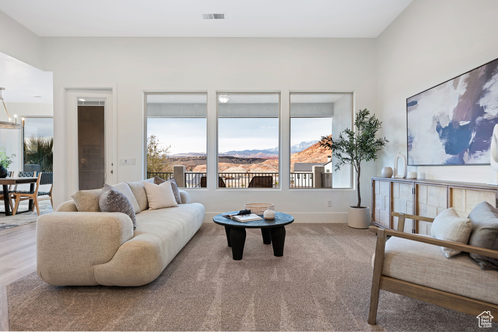 Living room featuring a mountain view and a chandelier