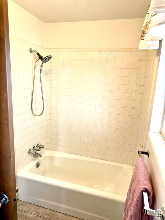Bathroom featuring bathing tub / shower combination