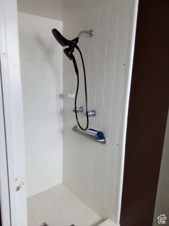 Full bath featuring a stall shower