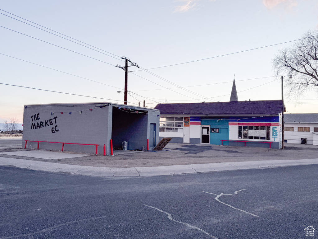 View of outdoor building at dusk