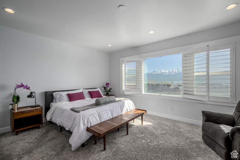 Bedroom with recessed lighting, carpet, and baseboards
