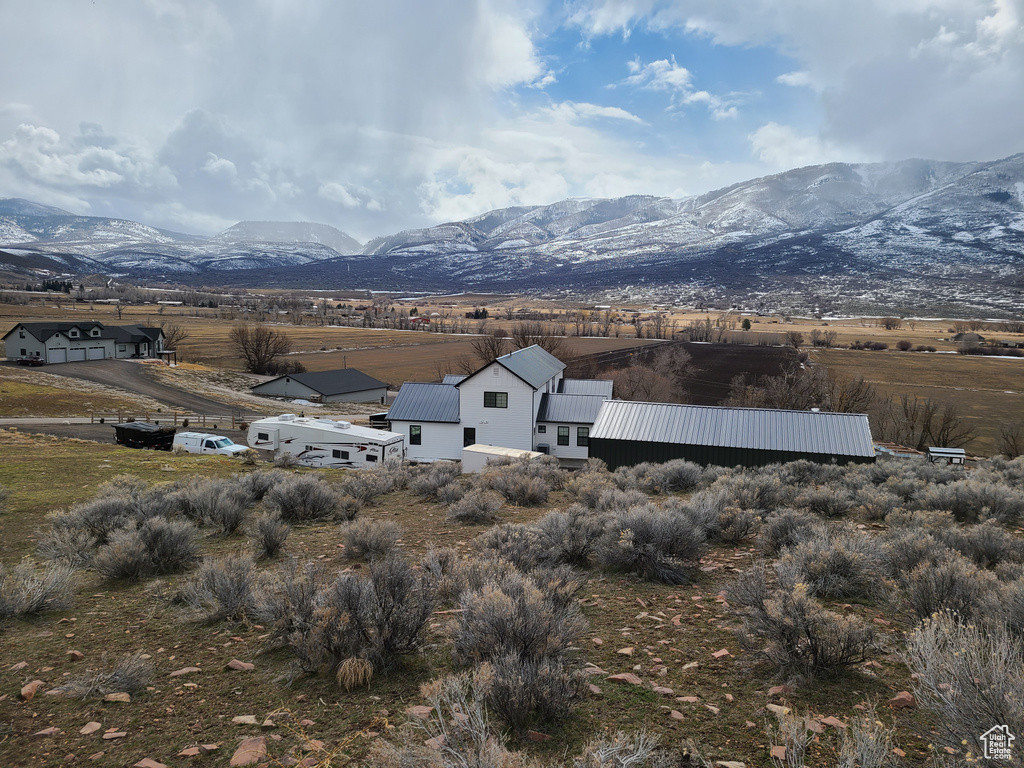 View of mountain feature with a rural view