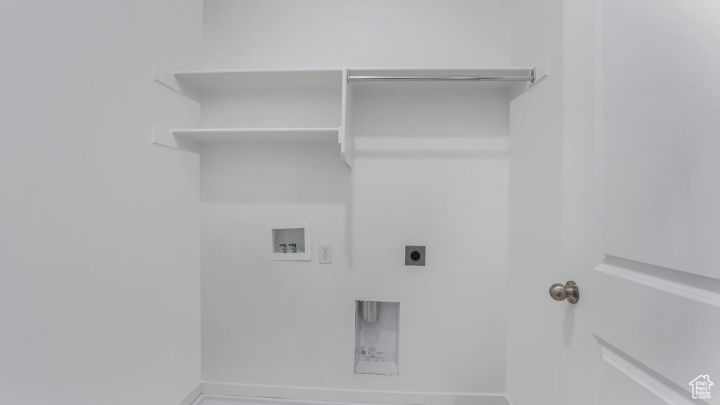 Laundry area with washer hookup and electric dryer hookup