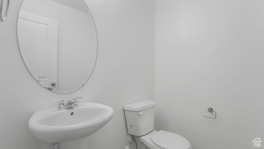 Bathroom with a sink and toilet