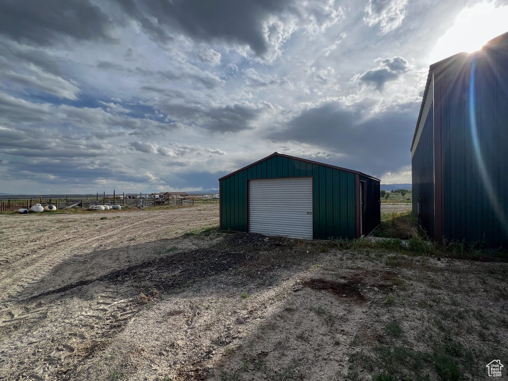 Garage featuring a rural view