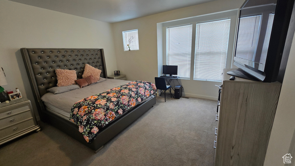 Bedroom featuring carpet