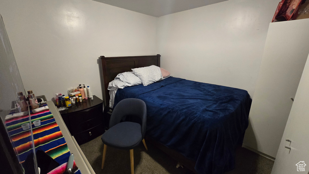 Bedroom with carpet flooring