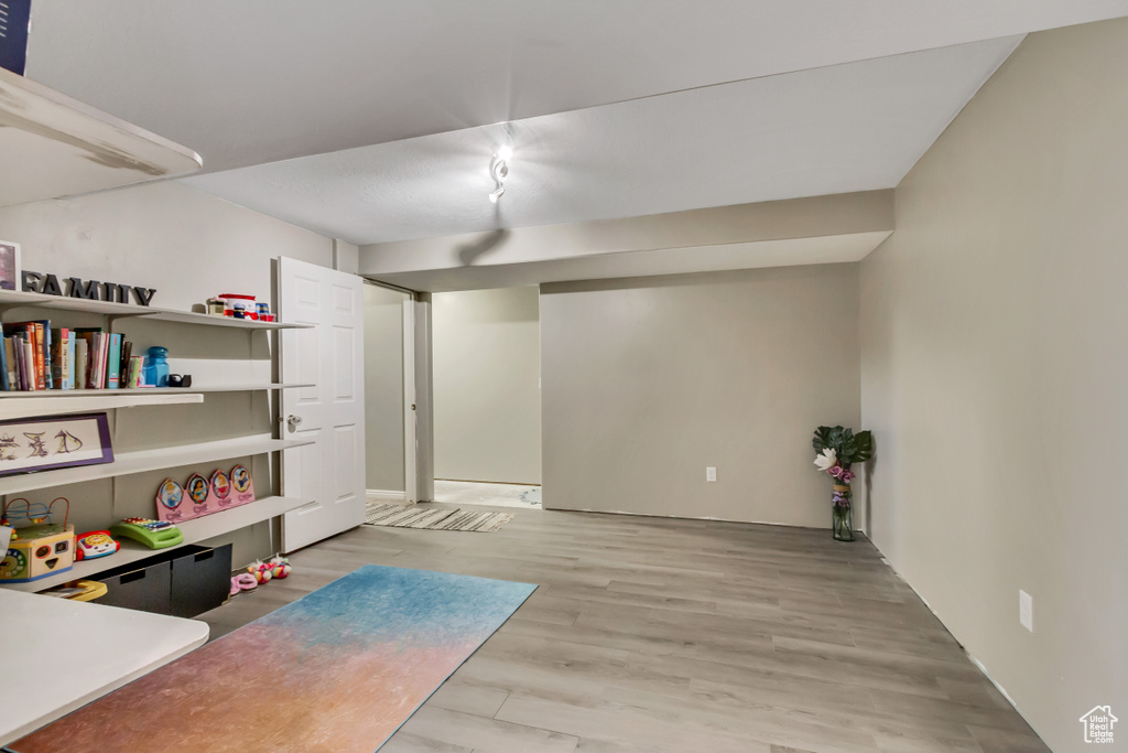 Recreation room featuring light hardwood / wood-style flooring