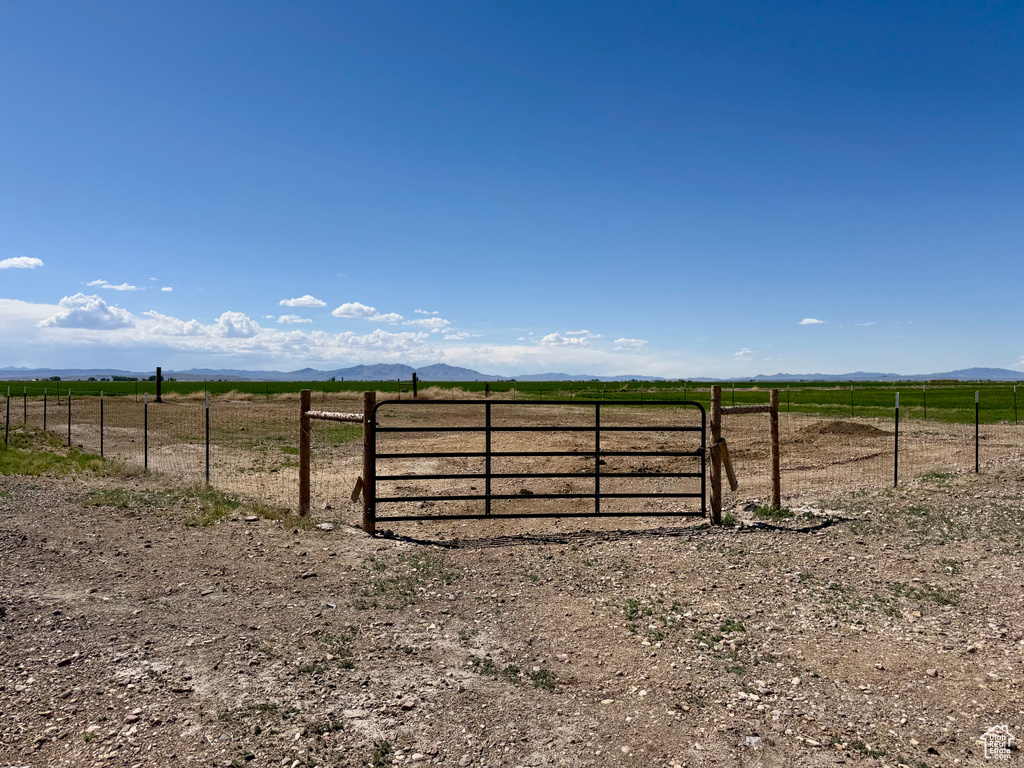 View of yard with a view of countryside and a mountain view