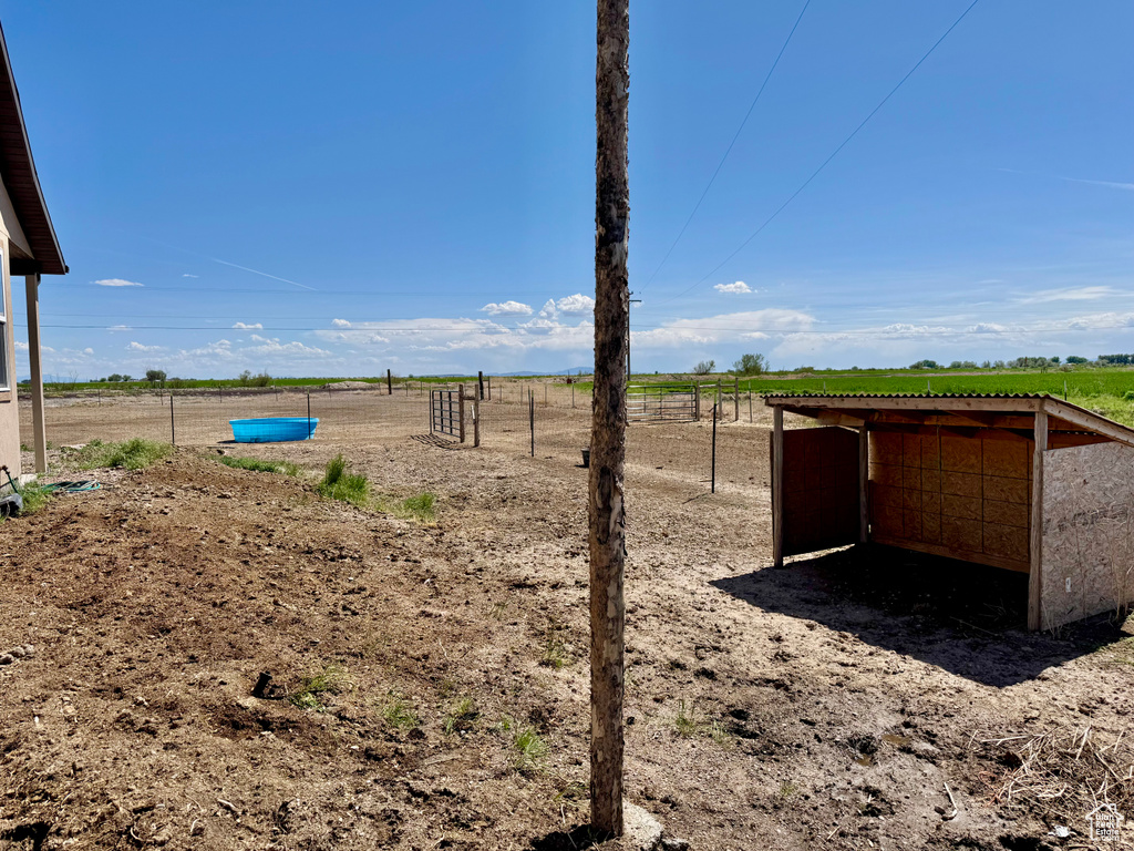 View of yard with a view of rural / pastoral area