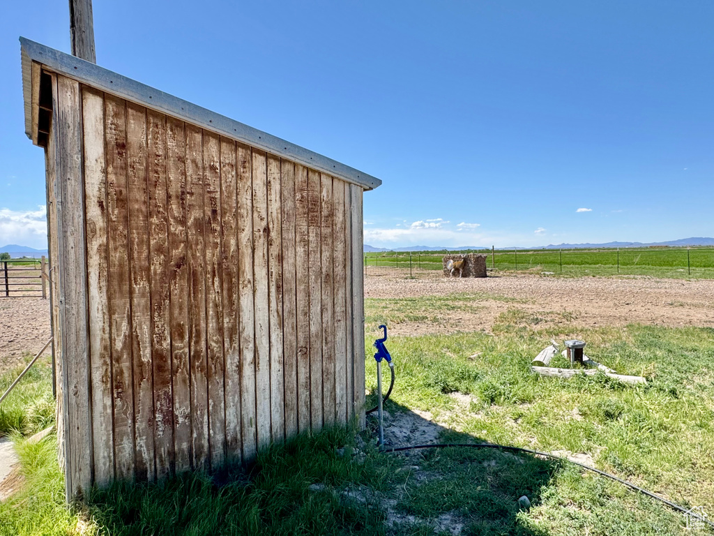 View of outbuilding featuring a view of countryside and a mountain view
