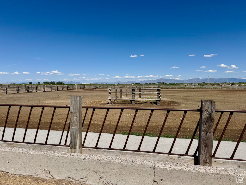 View of yard with a view of rural / pastoral area and a mountain view