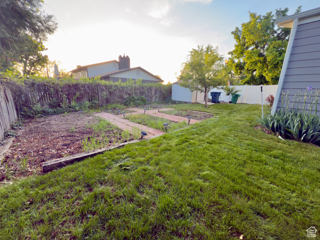 View of yard with a vegetable garden