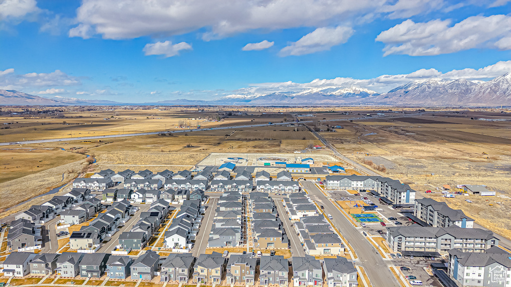 Birds eye view of property with a mountain view