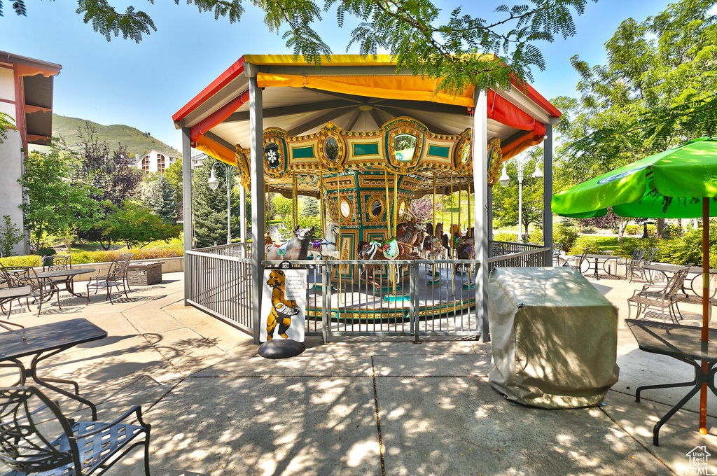 View of property\\\'s community featuring a patio and a mountain view