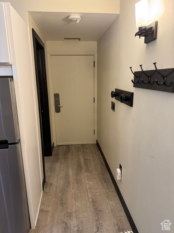 Hallway featuring hardwood / wood-style floors