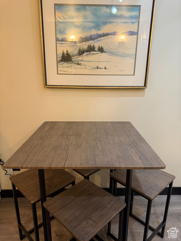Dining room with hardwood / wood-style floors