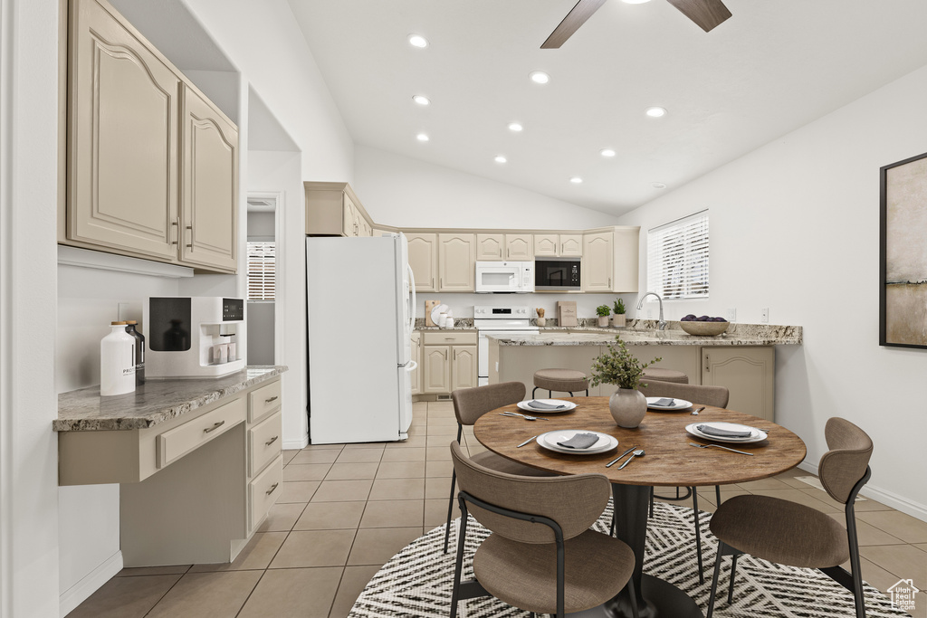 Dining room with light tile patterned floors, lofted ceiling, recessed lighting, a ceiling fan, and baseboards