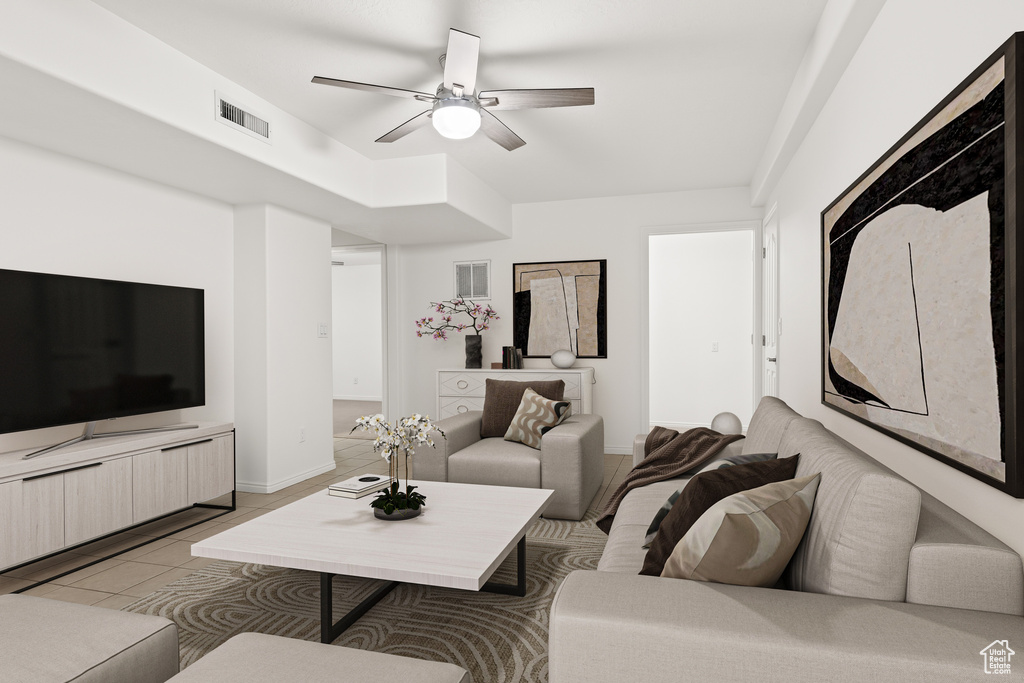 Living room with ceiling fan, light tile patterned flooring, and baseboards