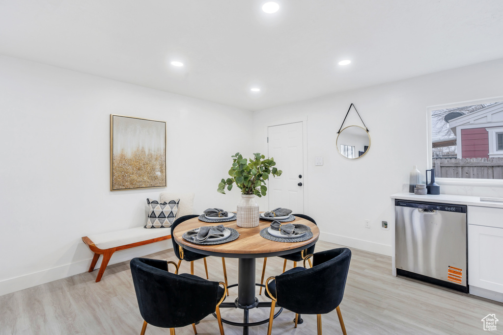 Dining room with light wood-type flooring