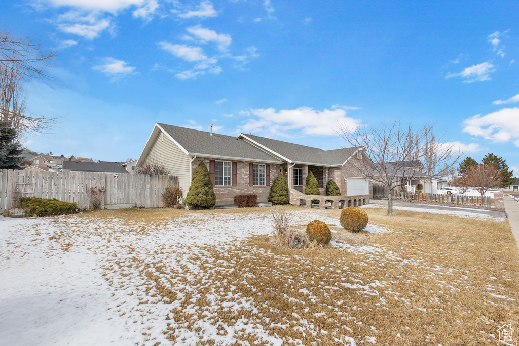 Single story home featuring a garage