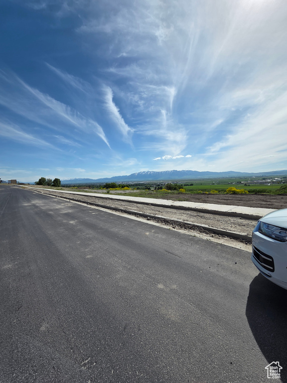 View of asphalt road with a mountain view