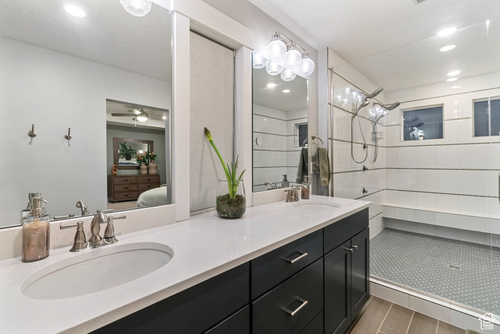 Bathroom featuring hardwood / wood-style flooring and vanity