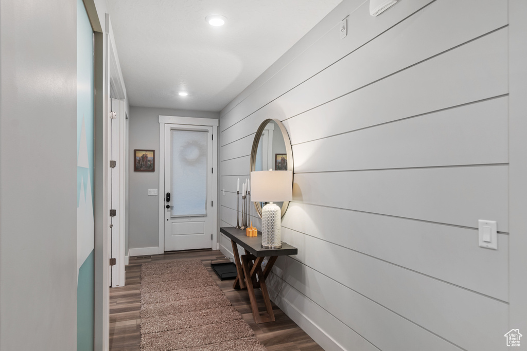 Doorway featuring dark hardwood / wood-style floors