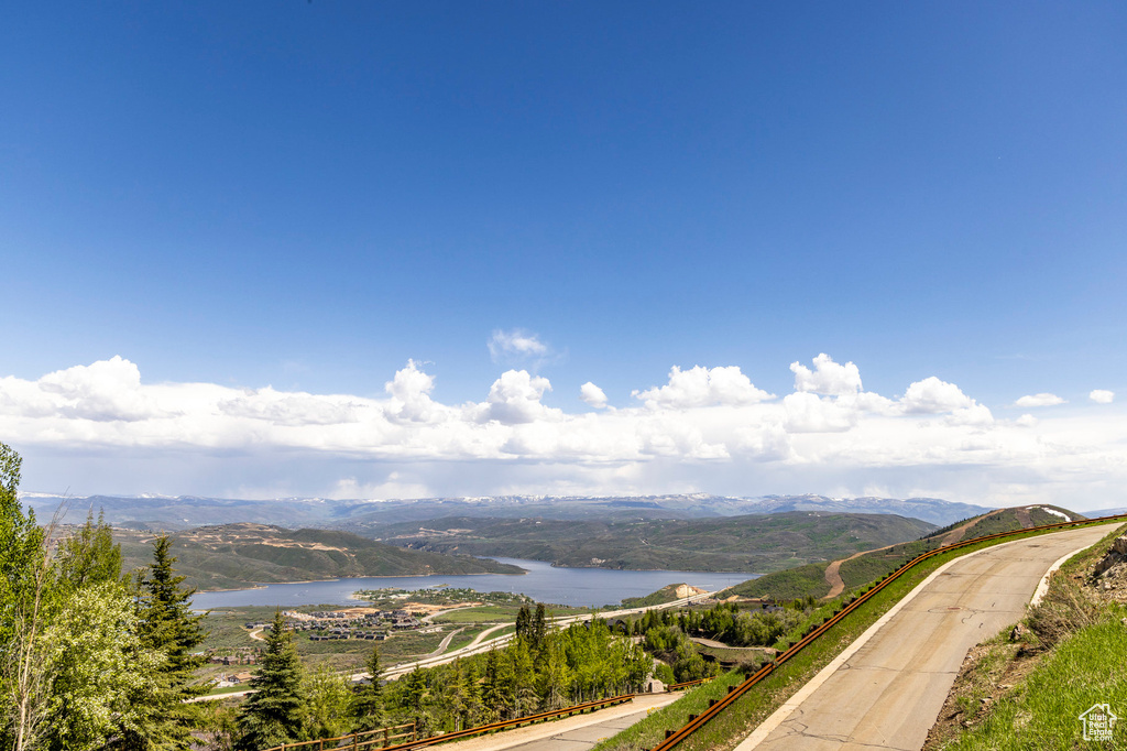 View of mountain backdrop with a nearby body of water