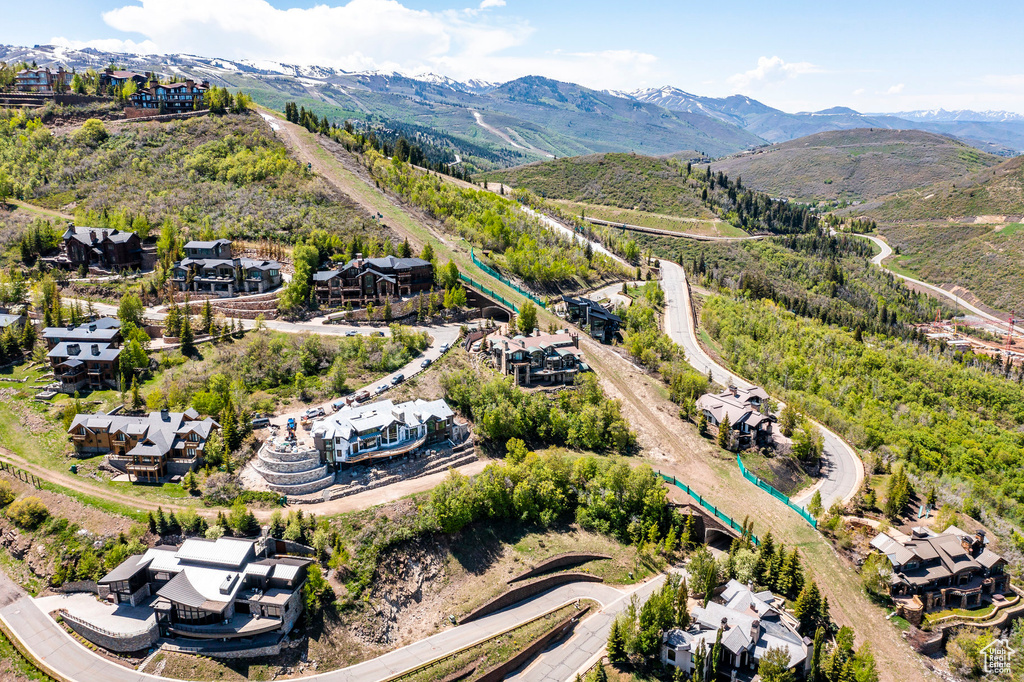 Aerial view of residential area with a mountain backdrop
