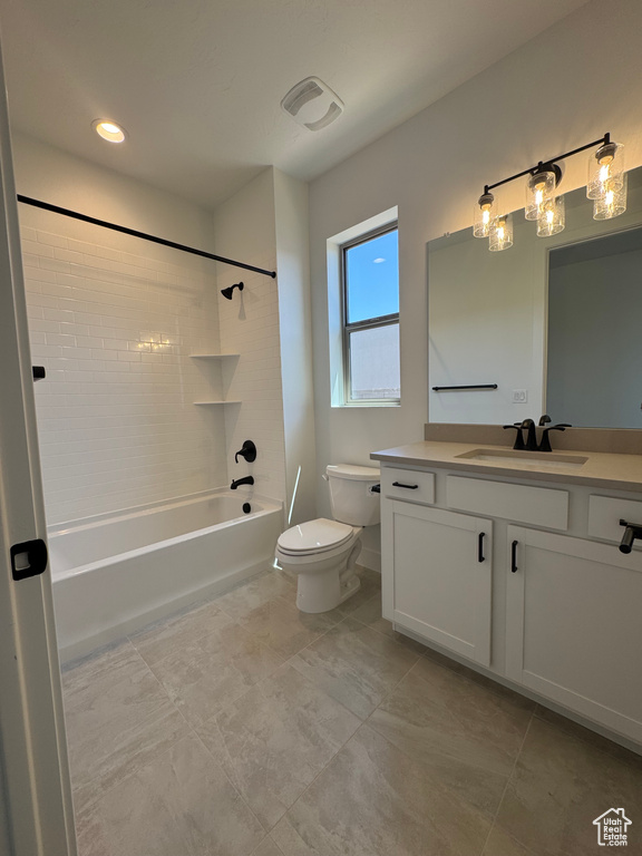 Full bathroom with toilet, vanity, shower / bathtub combination, and tile patterned flooring