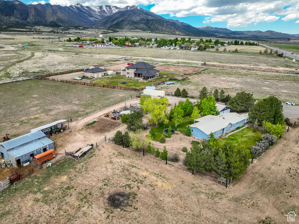 Overview of rural landscape with a mountain backdrop