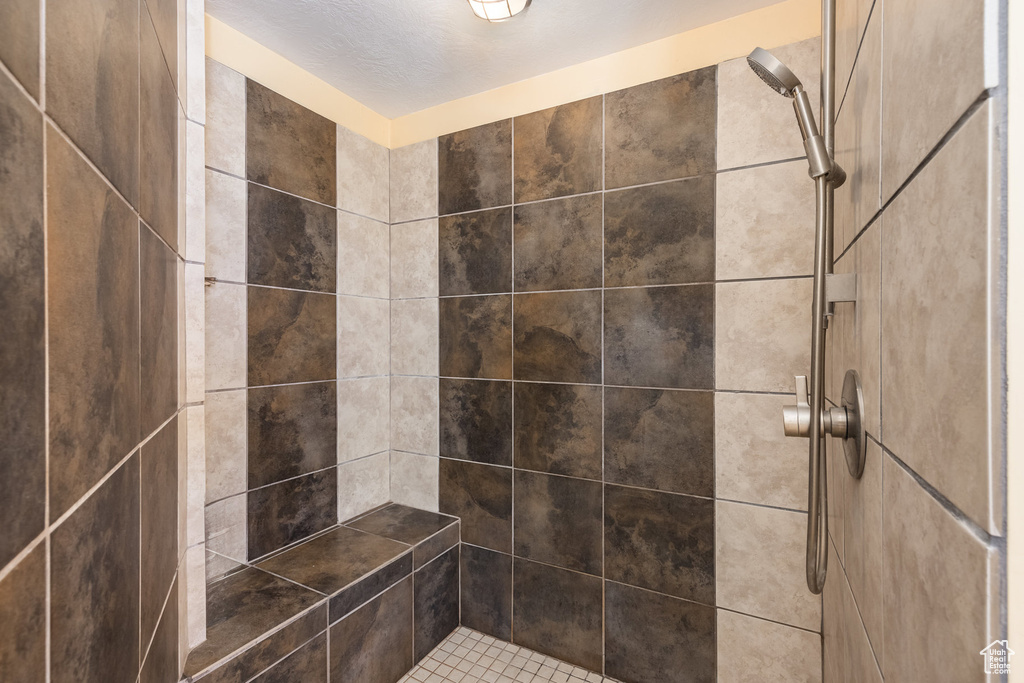 Bathroom with tiled shower