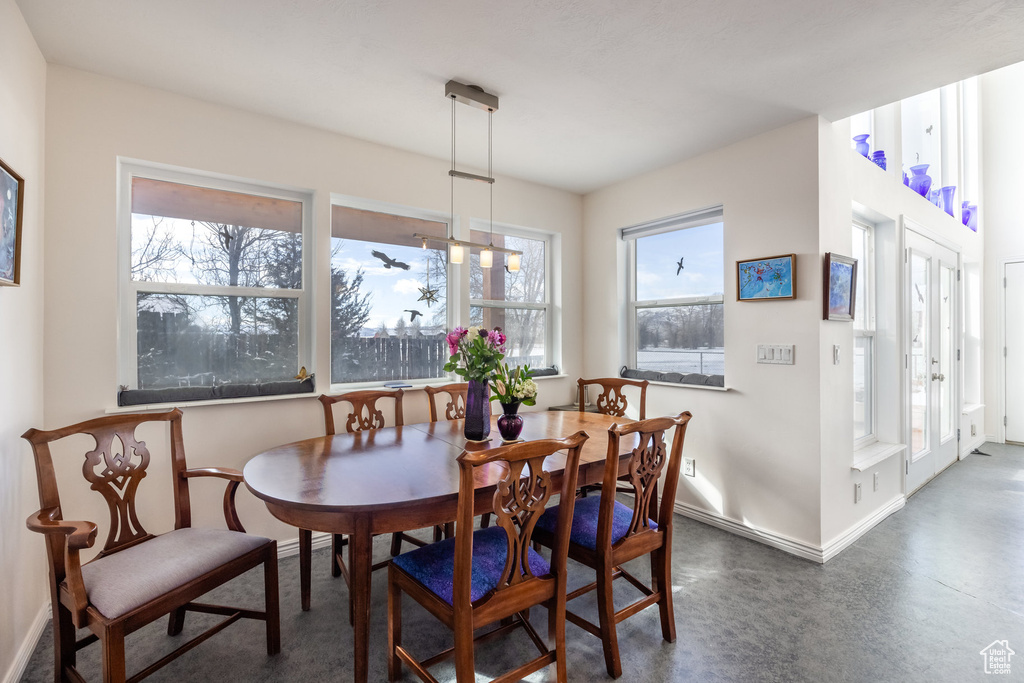 Dining space featuring baseboards