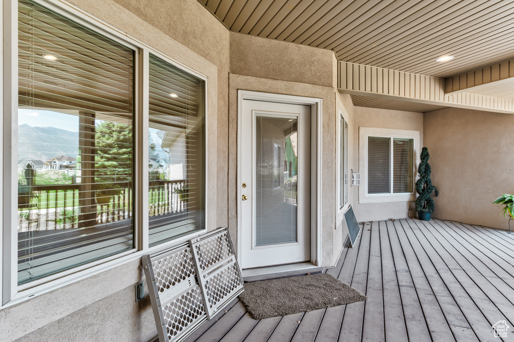 View of exterior entry featuring stucco siding