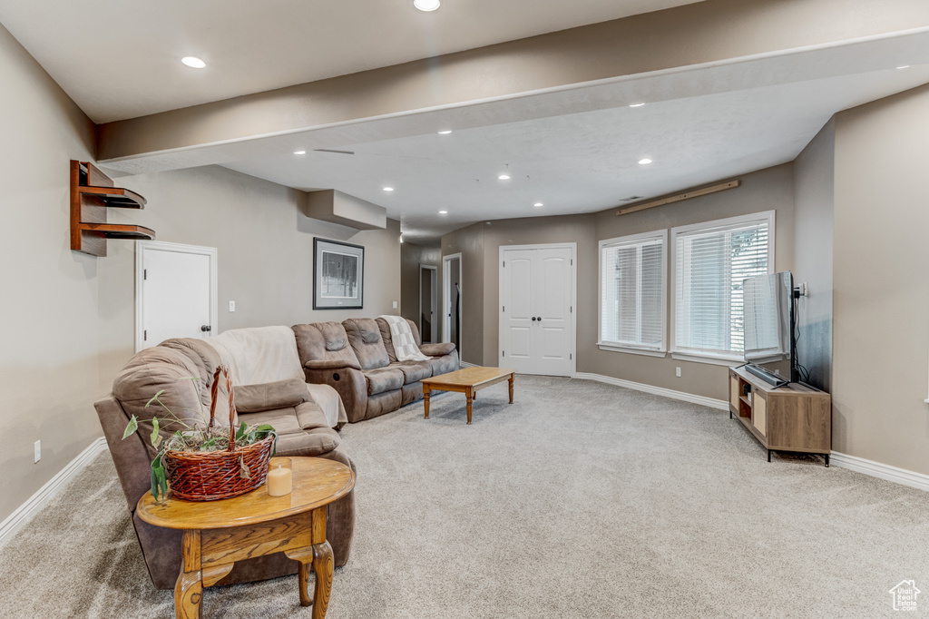 Living area featuring carpet and recessed lighting