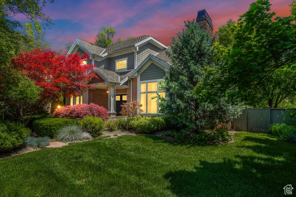 Craftsman-style house with a yard