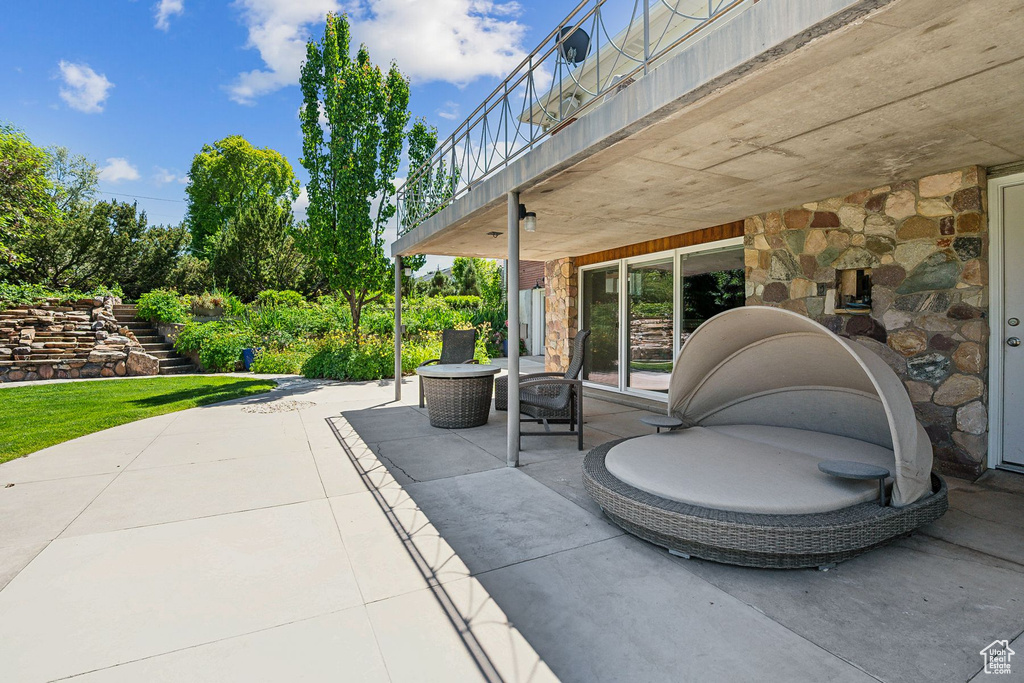 View of patio / terrace featuring stairs