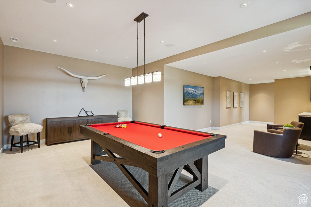 Recreation room with light colored carpet, billiards table, and recessed lighting