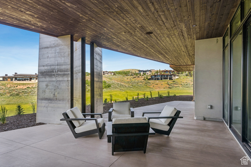 View of patio with an outdoor living space