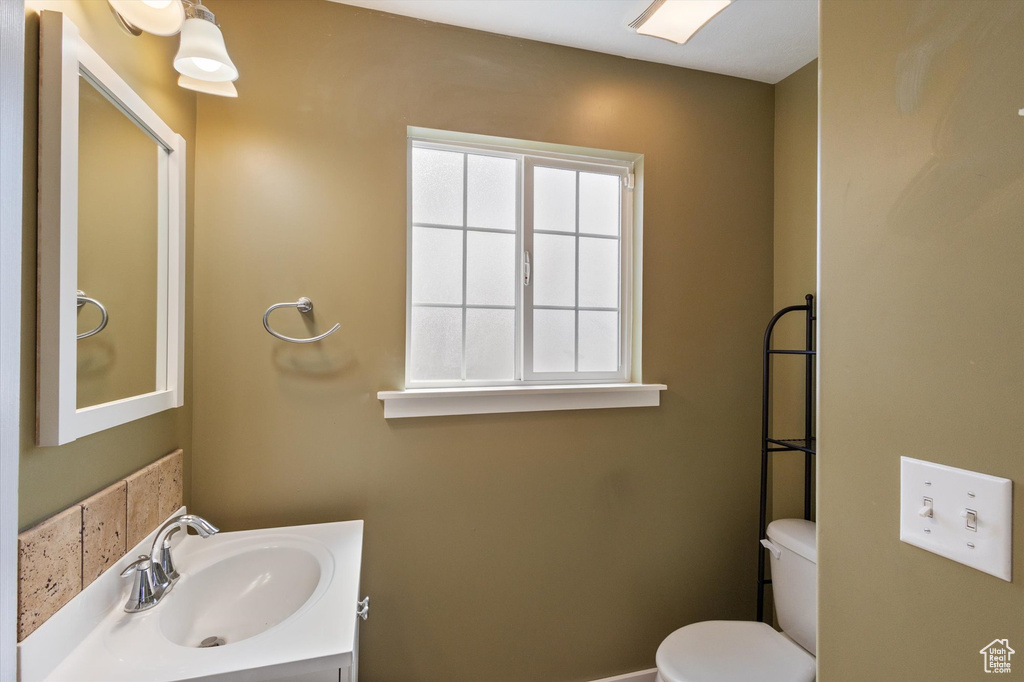 Bathroom with vanity and toilet