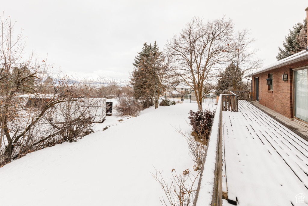 View of yard layered in snow