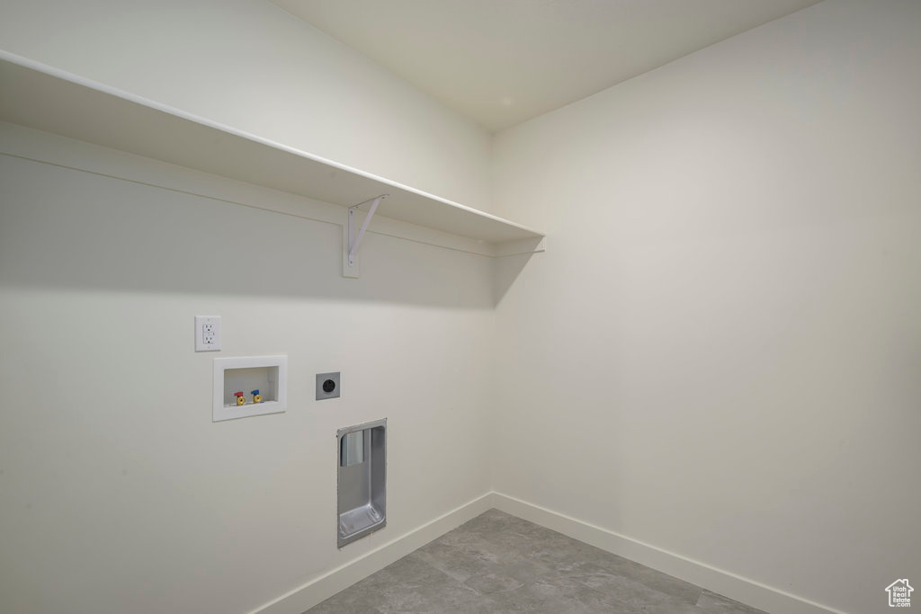 Laundry area with hookup for a washing machine and hookup for an electric dryer