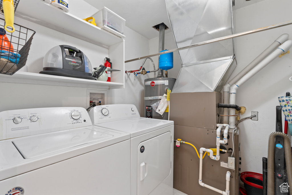 Washroom with gas water heater and washing machine and clothes dryer