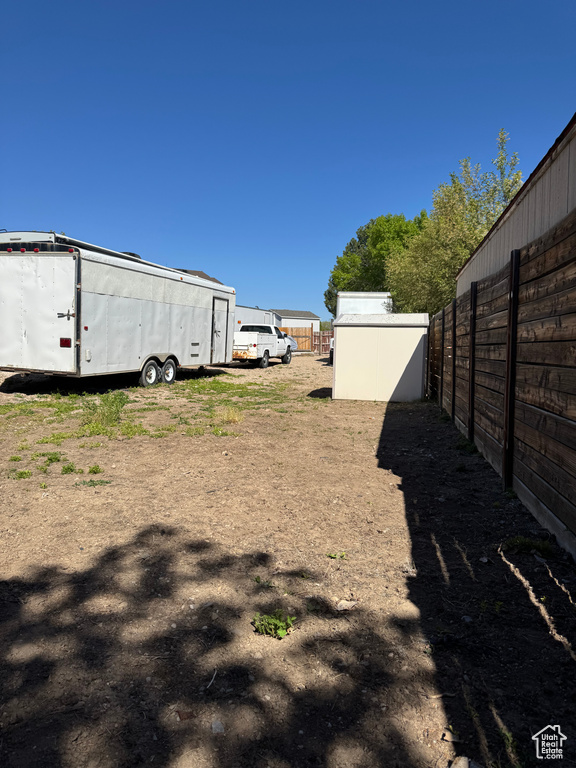 View of yard with fence